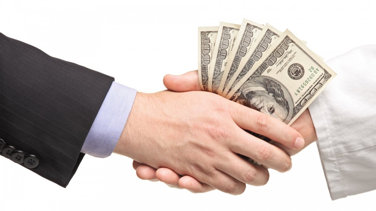 money-changing-hands-crop-1200x675
