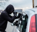 bigstock-car-thief-trying-to-break-into-129418745