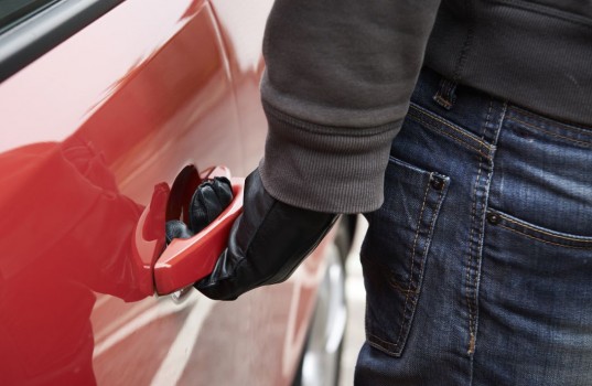 Car,Thief,Trying,Door,Handle,To,See,If,Vehicle,Is