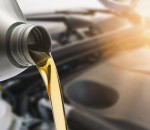 close-up-of-oil-pouring-in-car-royalty-free-image-1054347190-1540912843