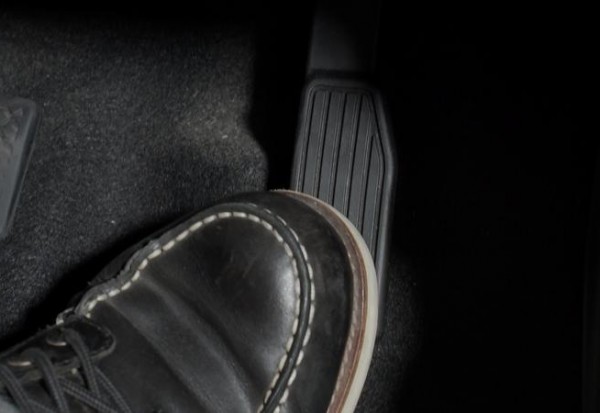 accelerate-and-brake-foot-pressing-foot-pedal-of-a-car-to-drive-ahead-accelerator-and-brake-pedal-in-a-car-driver-driving-the-car-by-pushing-accelerator-pedals-of-the-car-inside-vehicle-automobile-fre