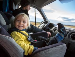 Cute,Toddler,Boy,,Kid,Sitting,On,The,Front,Seat,In